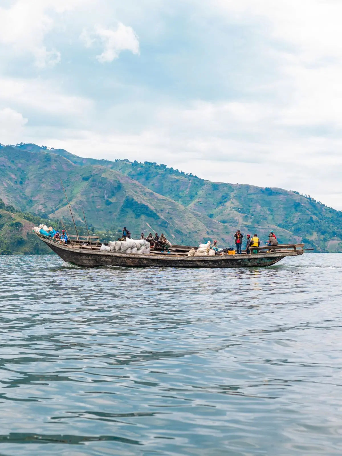 Boat of people on Lake Kivu off of Idjwi Island, DRC
