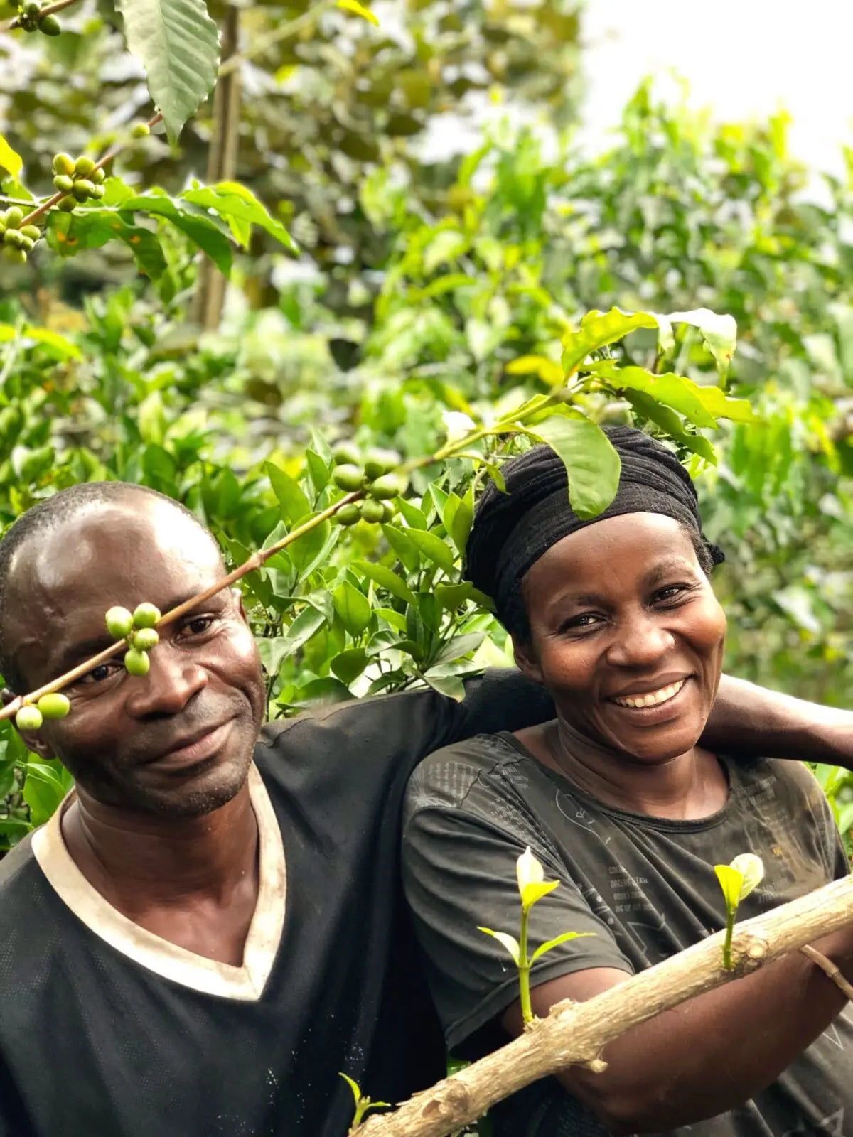 A man with his arm over a woman's shoulder: Roger and Anawaza from Muungano