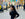 Mozzo Director of Coffee, Danielle, stood in Times Square drinking a Mozzo coffee