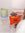 Hands taking out a brew-in-cup coffee bag out of a Mozzo sachet