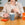 Woman putting Mozzo coffee bag into blue grey mug