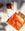 Mozzo HOUSE coffee bag on white blanket next to sunglasses