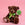 Brown teddy bear with coffee bean stitched into foot and green Mozzo x Hospital of Hope ribbon sat on a pink background