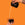 Tattooed arm pouring milk into a cup of Mozzo coffee from a height against an orange background